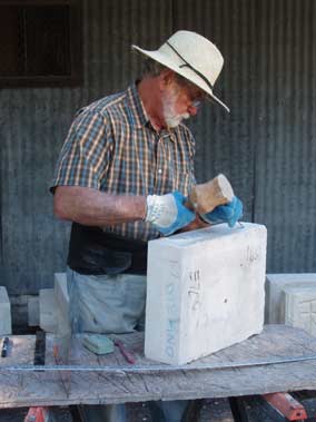 Warren Arnold Carves Peach Block.